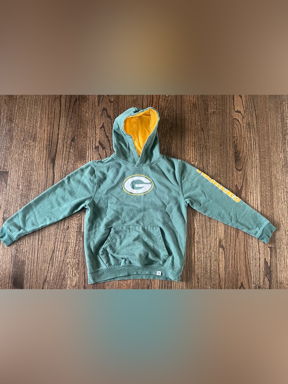 Fanatics Green Hoodie with Yellow Hood Lining and Team Logo